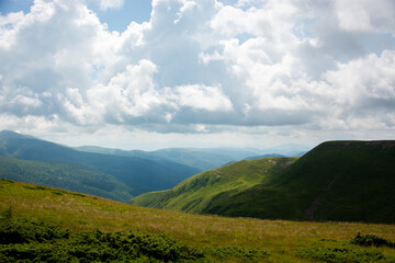 Picturesque view of the mountains that glow under sunlight. Dramatic morning scene. Location place Carpathian national park, Ukraine, Europe. Artistic picture. Beauty world. Warm toning effect.