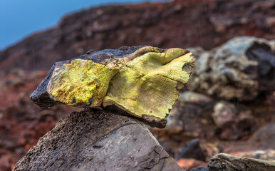 Close-up of a lava piece of bright yellow color