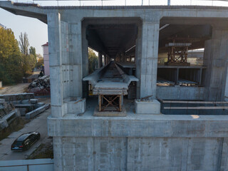 Fototapeta na wymiar Aerial drone view. Construction of the metro level across the bridge.
