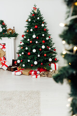Fototapeta na wymiar Christmas tree fireplace for the new year decor of the house