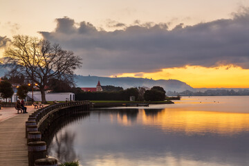 Lake Rotorua, New Zealand, at sunset, seen from the Rotorua lakefront boardwalk