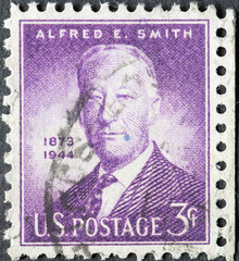 USA - Circa 1945: a postage stamp printed in the US showing a portrait of the American politician and multiple governor of the US state of New York Alfred E. Smith