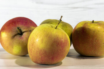 green apples in a white table