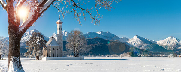 panoramic landscape at winter with church st. Coloman in Bavaria