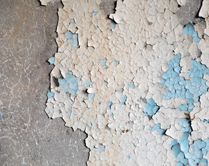 Old painted wall, peeling paint texture.
