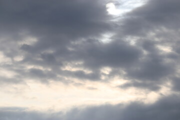 Obraz premium Sunlight shines through the clouds