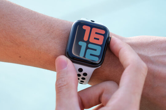 Apple Watch Series 4 with white Nike Sport Band on the wrist outdoor images 03.12.2019 Bornova, Izmir, Turkey