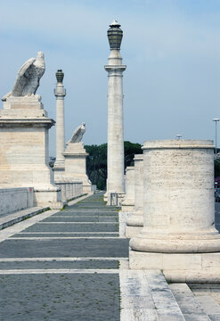 Ponte Flaminio is a bridge over the Tiber in rationalist architecture adorned with sculptures and travertine columns.