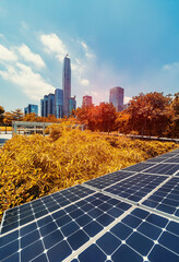 Ecological energy renewable solar panel plant with urban landscape landmarks