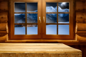 Wooden table of free space and winter window 