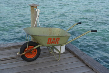 red wheelbarrow on the ground