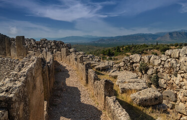 Fototapeta na wymiar Imposing ruins of Mycenae, an archaeological site near Mykines in Argolis, north-eastern Peloponnese, Greece.