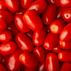 Red ripen cherry tomatoes. Pattern, top view, macro shot.
