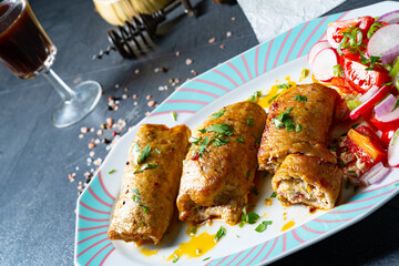 Vegetable roulade from roast  pork loins with salads