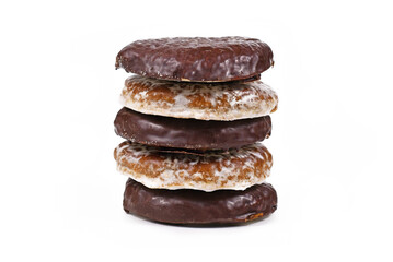 Stack of German round gingerbread called 'Lebkuchen' isolated on white background