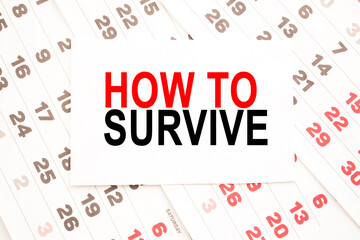 text HOW TO SURVIVE on a sheet from Notepad.a digital background. business concept . business and Finance.