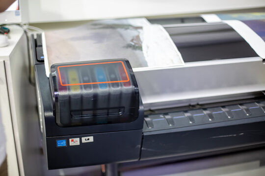 Moscow, Russia - October 04, 2019: close-up of a fragment of a Hewlett Packard plotter with a color cartridge compartment