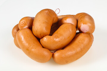 Tasty meat sausages over white background