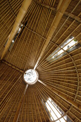 The roof of the house made of bamboo