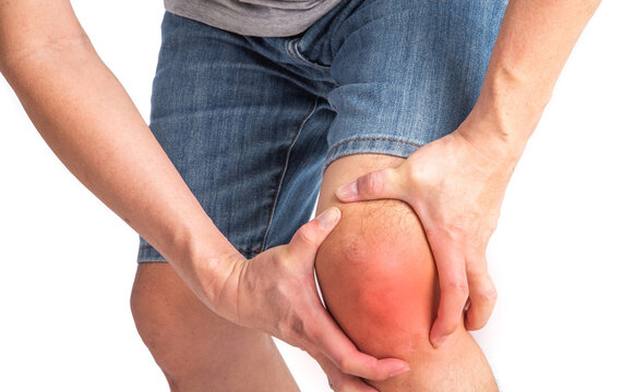Joint injuries, Area of the injury, the image on a clean background. spasm on the man's knee.