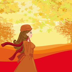 Woman with hat in autumn landscape