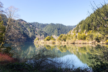 Beautiful reflection in Umpqua River, Oregon, in spring day