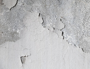 Old painted wall, peeling paint texture.
