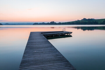 Fototapeta premium beautiful sunset at the lake mattsee, austria