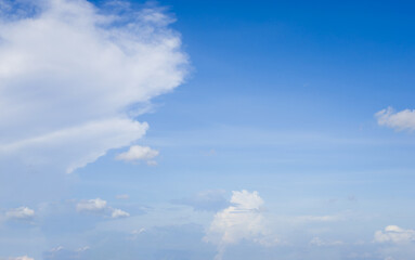 beautiful blue sky and white fluffy cloud horizon outdoor for background.