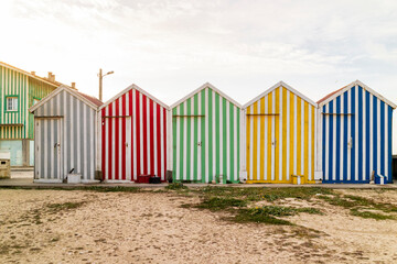 Obraz na płótnie Canvas bunte Gerätehäuser der Fischer in Vieira de Leiria/ Portugal