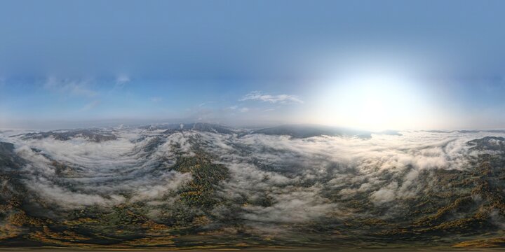 Beautiful 360 degree view at the foggy mountains.