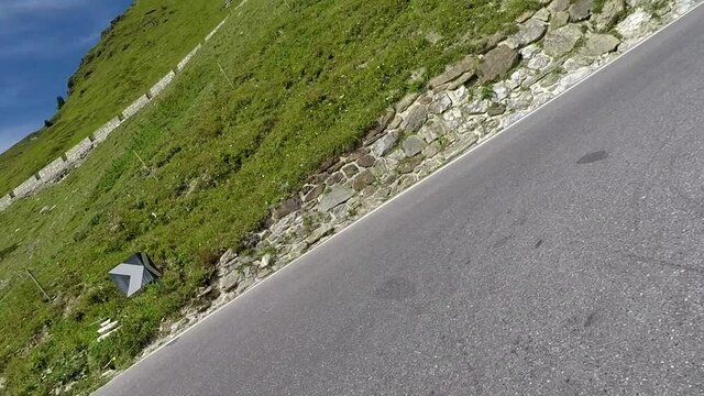 Motorcycle curves driving up the Stelvio Pass by motorbike. Includes three different video sequences!