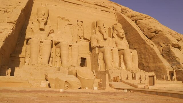 Stable panning shot with gimbal of the temple of Abu Simbel in southern Egypt in Nubia next to Lake Nasser. Temple of Pharaoh Ramss II, 4k video