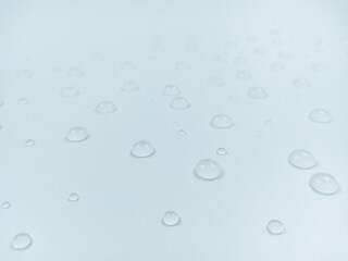 Clear water drops on white background.