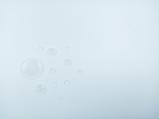 Clear water drops on white background with free copy space.