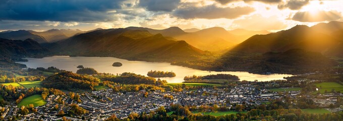 Panoramic view of popular tourist destination; Derwentwater in the Lake District, UK. Rays of light can be seen breaking through the dramatic clouds, illuminating the fells!