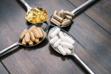 on four tablespoons there are different tablets and pills