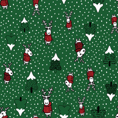 Funny christmas seamless background with deer in a sweater and christmas tree. Christmas motives printing on paper, textiles, fabric, wallpaper.