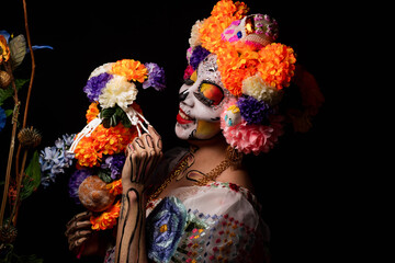 Woman personified as catrina on the day of the dead