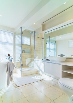 Sunny white modern home showcase interior bathroom