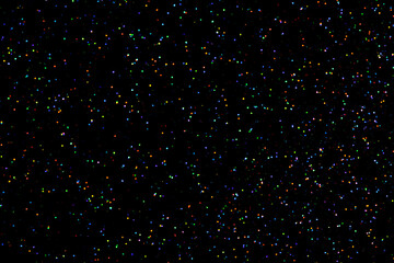 glitter sparkle powder background isolated on black background, star glitters background