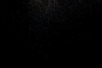 glitter sparkle powder background isolated on black background, star glitters background