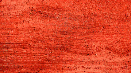 rustic rough orange travertine stone tile texture. orange stone texture background for halloween concept.