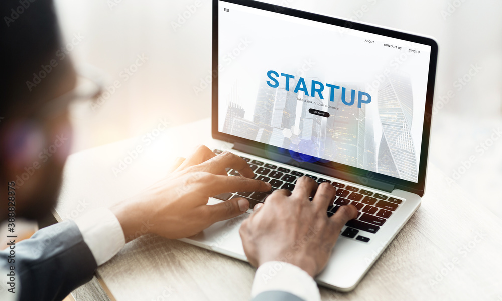 Poster online business concept. unrecognizable black entrepreneur using website for startup projects on his