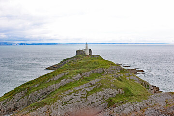 Fototapeta na wymiar Mumbles Lighthouse in Swansea Bay, Wales