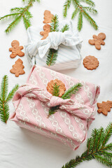 Christmas eco-friendly gift wrap in traditional japanese furoshiki style, eco-friendly gift wrap and Zero Wast concept