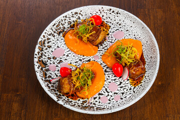 Baked pork with carrot sauce
