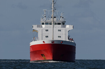 MERCHANT VESSEL - Red ship on a cruise at sea