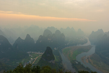 Naklejka premium The beautiful lines of mountains and rivers, amazing light and shadow. Located near Guilin, Guangxi, China.