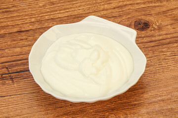 Sour cream in the bowl